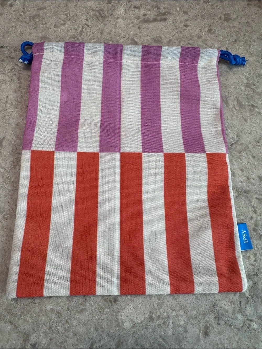 ipsy Striped Drawstring Cosmetic Bag in Pink, Orange, White with Blue Cord